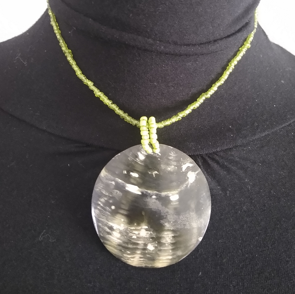 Beaded necklace with shell